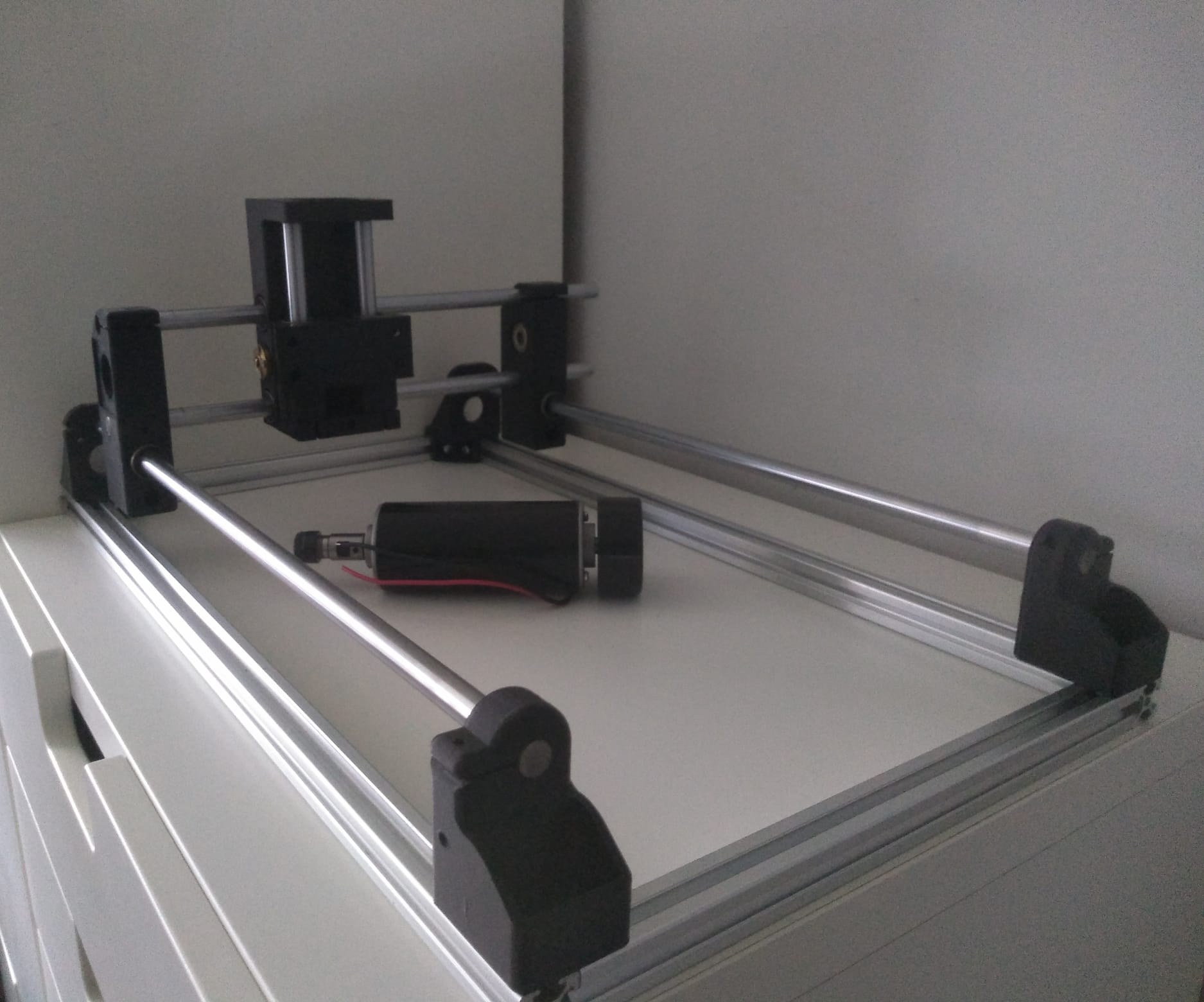 CNC machine frame with rails and spindle motor